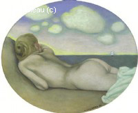 Nu à plat ventre au bord de la mer